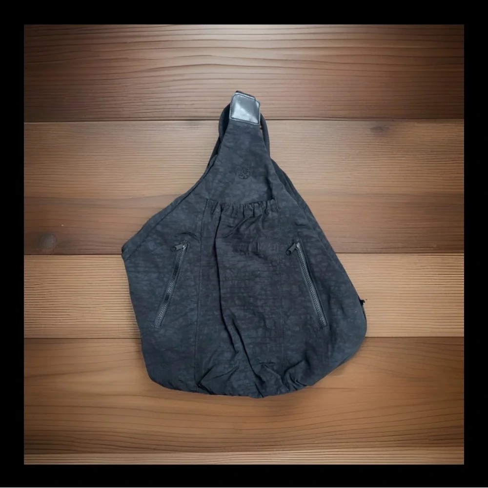 GAIAM Black Sling Backpack - Compact Crossbody Pack